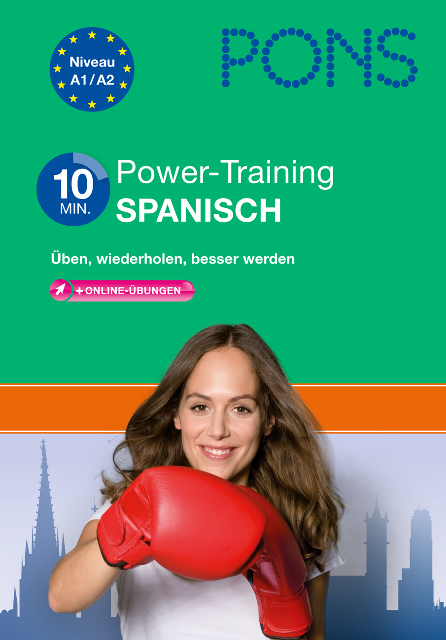Das Buchcover von PONS Power-Training Spanisch zeigt eine lächelnde Frau mit langen braunen Haaren, die rote Boxhandschuhe trägt, vor einem grünen Hintergrund mit Text und einer Stadtsilhouette.